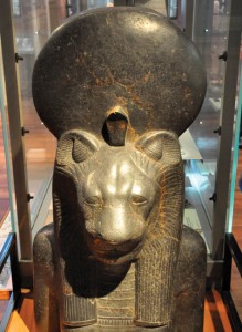 The fierce lioness goddess Sekhmet is the daughter of sun god Ra. She wears the sun on her wig as a headdress, protected by a spitting cobra. Granite. From Egypt, 18th dynasty, reign of Amenhotep III, 1390-1352 BCE. The Kelvingrove Art Gallery and Museum, Glasgow, Scotland, UK (loaned by the British Museum).